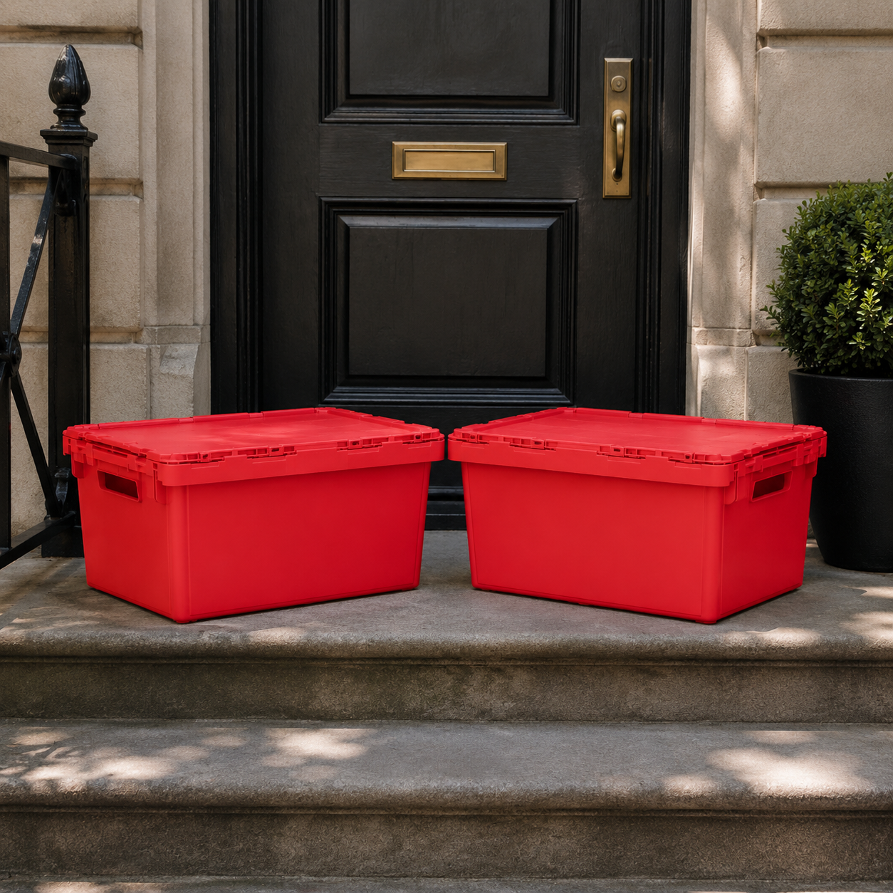Multiple EazyCrates red plastic rental moving boxes — reusable, stackable, eco-friendly