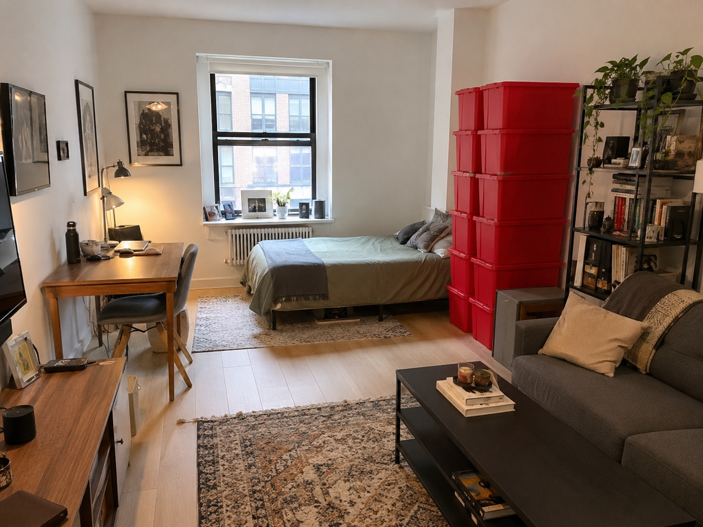 Person packing and organizing belongings in a NYC apartment before moving day